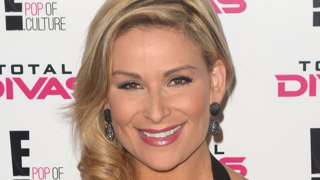 BEVERLY HILLS, CA - AUGUST 13: WWE Diva Natalya arrives to the WWE SummerSlam Press Conference at Beverly Hills Hotel on August 13, 2013 in Beverly Hills, California.  (Photo by Keipher McKennie/WireImage)