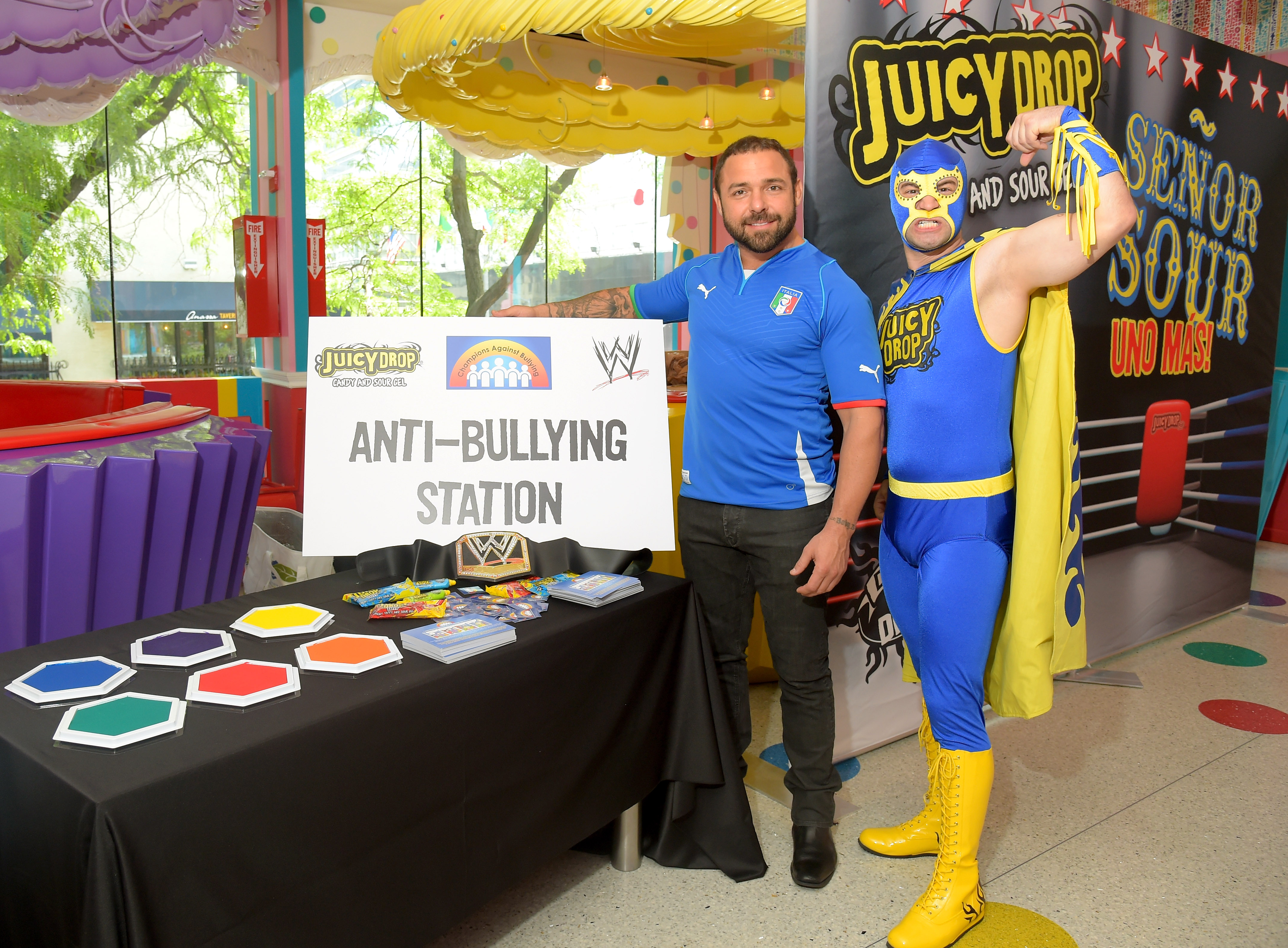 NEW YORK, NY - JULY 02:  Senor Sour (R) and Santino Marella attend Juicy Drop and WWE Superstar Santino Marella dare kids to test their limits benefitting Champions Against Bullying at Dylan's Candy Bar on July 2, 2014 in New York City.  (Photo by Michael Loccisano/Getty Images for Bazooka Candy Brands/Topps)