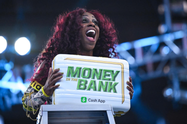 Naomi Is Carrying Some Wild Items In Her Money In The Bank Briefcase